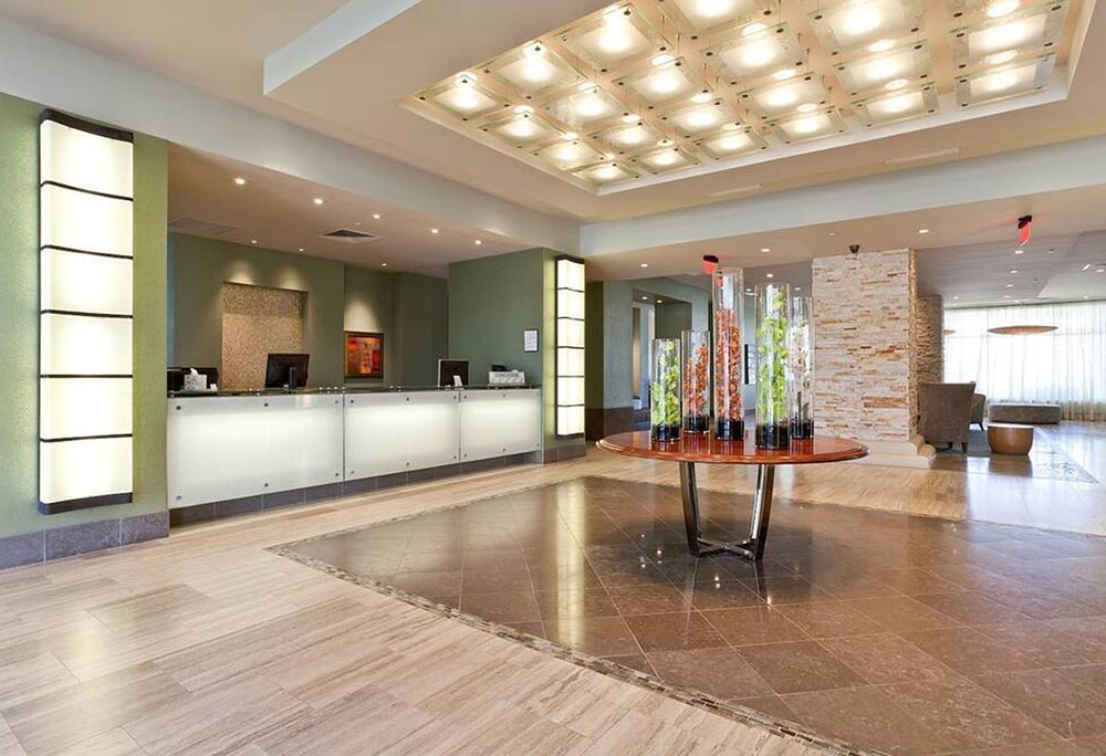 Sapphire Tower lobby with columns and warm lighting, South Padre Island