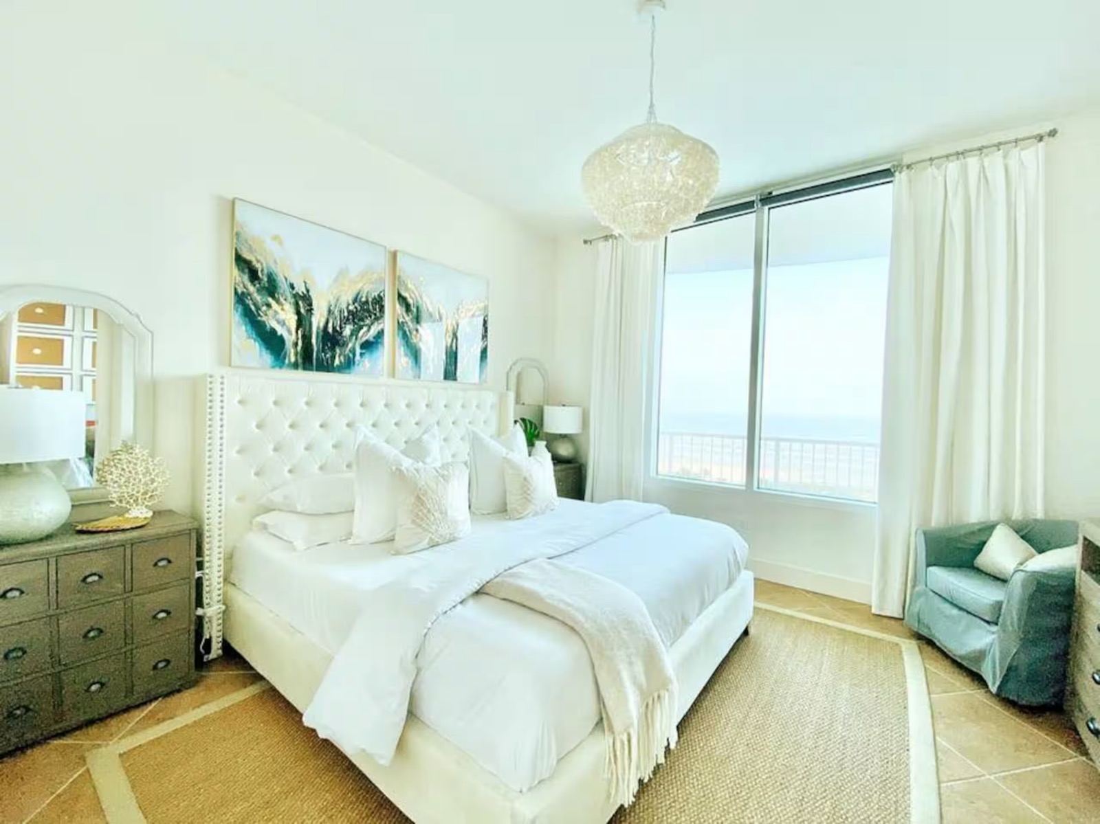 Primary bedroom with king bed and coastal styling at Casa Cova, South Padre Island